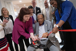 Ribbon cutting at exhibit opening