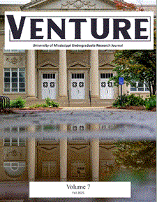 Fulton Chapel reflected in a puddle