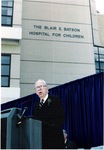 Batson at hospital dedication, behind podium by Blair E. Batson and University of Mississippi. Medical Center