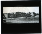 Photograph of pueblo buildings by Calvin S. Brown