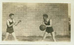 Grover Catt and James Earl Drane playing basketball