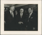 Claude F. Clayton with two unidentified men. by Author Unknown