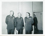 General Claude F. Clayton with two unidentified men. by Author Unknown