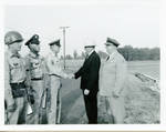 Senator Yarbrough shaking hands with military personnel. by Author Unknown