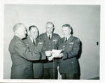 Claude F. Clayton with three unidentified men. by Author Unknown