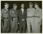 Claude F. Clayton with Roach, Wilson, Governor Paul B. Johnson Jr., and unidentified officer. by Author Unknown