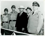 Claude F. Clayton with four unidentified men. by Author Unknown