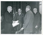 Claude F. Clayton with Senator John C. Stennis, Jack Reed, and Senator James O. Eastland. by Author Unknown