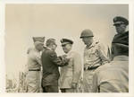 General Clayton receiving a medal. by Author Unknown