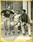 Bruiser Kinard with coach and other player by J. R. Cofield