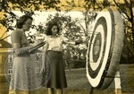 Women practicing archery by J. R. Cofield
