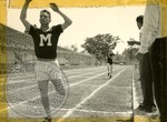 Ole Miss track runner by J. R. Cofield