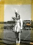 Drum majorette and Marching Band by J. R. Cofield