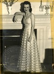 Woman in formal wear by J. R. Cofield