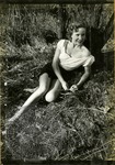 Woman posing outside by J. R. Cofield