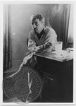 William Faulkner at his desk at Rowan Oak by Unknown