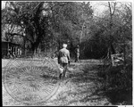 William Faulkner walking toward Andrew Price at Rowan Oak by Unknown