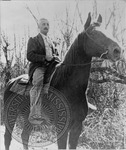 William Faulkner on his horse, Tempy by Unknown