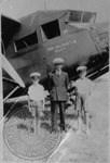 John Faulkner and his sons Chooky and Jimmy in front of his plane by Unknown