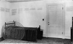 Rowan Oak office showing bed with writing on wall by Unknown