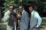 Portrait of Colonel J. R. and Jack Cofield with camera and unknown individual, image 2 by Walt Mixon