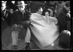 Couple under a blanket at a game, image 2 by J. R. Cofield