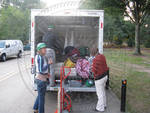 People Unloading Truck by Bill Kingery