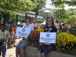 Two Women Holding Barack Obama Signs in Grove by Bill Kingery