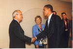 Barack Obama shaking hands with man backstage at Ford Center during the 2008 Presidential Debate at the University of Mississippi, image 001 by Author Unknown