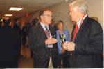 Chancellor Robert Khayat talking to unidentified man during the 2008 Presidential Debate at the University of Mississippi by Author Unknown