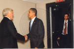 Chancellor Robert Khayat shaking hands with Barack Obama backstage at the Ford Center during the 2008 Presidential Debate at the University of Mississippi by Author Unknown