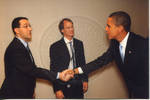 Barack Obama shaking hands with man backstage at Ford Center during the 2008 Presidential Debate at the University of Mississippi, image 003 by Author Unknown