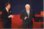 Chancellor Robert Khayat and unidentified man on Ford Center stage during the 2008 Presidential Debate at the University of Mississippi by Author Unknown