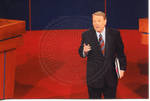 Moderator Jim Lehrer on stage at the Ford Center during the 2008 Presidential Debate at the University of Mississippi by Author Unknown