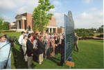 Chancellor Robert Khayat addresses the crowd at the dedication of the 2008 Presidential debate plaque in front of the Ford Center at the University of Mississippi, image 001 by Author Unknown