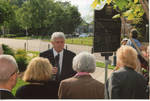 Chancellor Robert Khayat addresses unidentified guests at the dedication of the 2008 Presidential debate plaque at the University of Mississippi, image 001 by Author Unknown