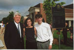 Chancellor Robert Khayat with unidentified man and woman in front of 2008 Presidential debate plaque at the University of Mississippi; 2 copies, image 002 by Author Unknown