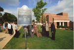 Chancellor Robert Khayat and unidentified guests at dedication of the 2008 Presidential debate plaque in front of the Ford Center at the University of Mississippi, image 004 by Author Unknown