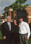Chancellor Robert Khayat with unidentified man and woman in front of 2008 Presidential debate plaque at the University of Mississippi, image 002 by Author Unknown