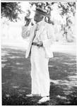Unidentified man in white suit. by Author Unknown