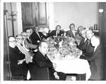 Felton M. Johnston and others dining. by Author Unknown