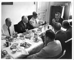 Lyndon Baines Johnson at table with members of Congress. by Jim Whitmore