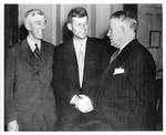 Senator John F. Kennedy with unidentified men. by Author Unknown