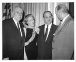Felton and Wanda Johnston with others at a function. by Author Unknown