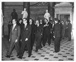 Felton M. Johnston and others walk to President Eisenhower's State of the Union address. by Author Unknown