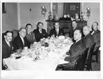 Felton M. Johnston and others at dinner. by Author Unknown