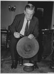 Senator Ellison Smith with rubber mat and spittoon. by Harris & Ewing
