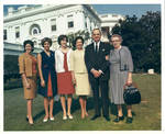 Felton M. Johnston with unidentified women in the White House Rose Garden. by Author Unknown