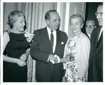 Felton and Wanda Johnston with others at a function. by Author Unknown