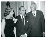 Felton and Wanda Johnston with unidentified man at a function. by Author Unknown